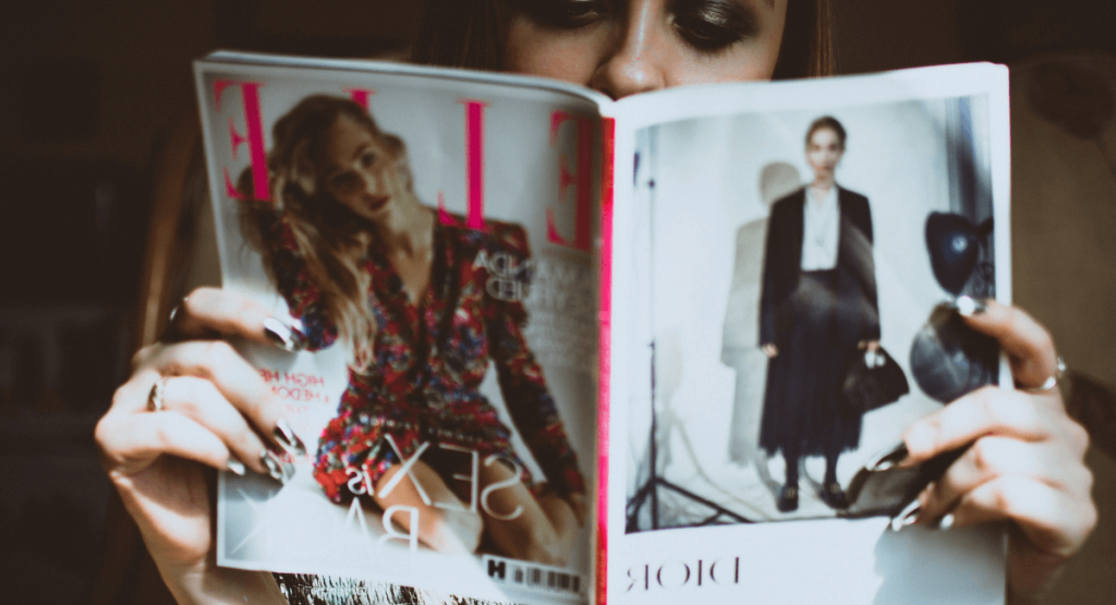 Fashion Magazine Statistics - Woman Reading Elle Magazine