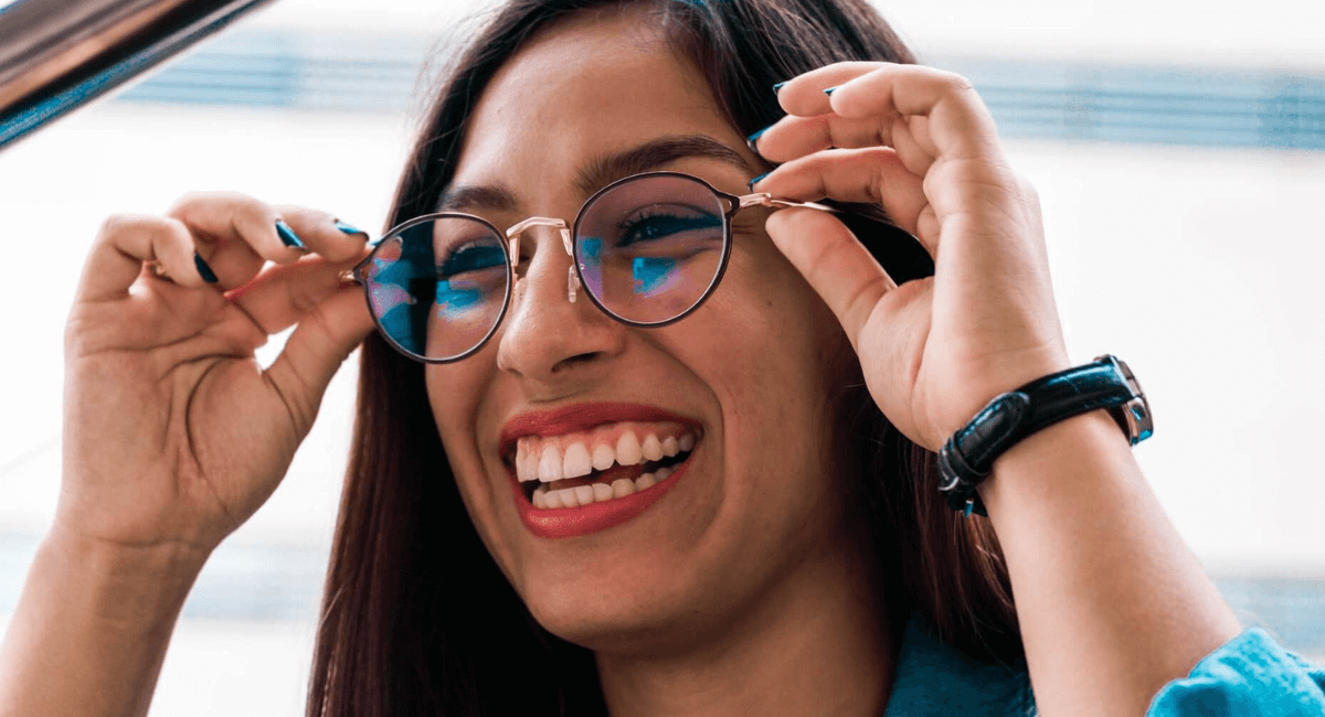 What Glasses Suit My Face - woman trying out glasses