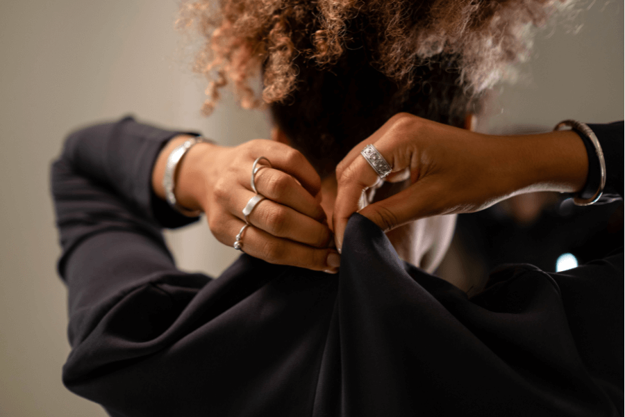 Types of Rings - A woman zipping her dress