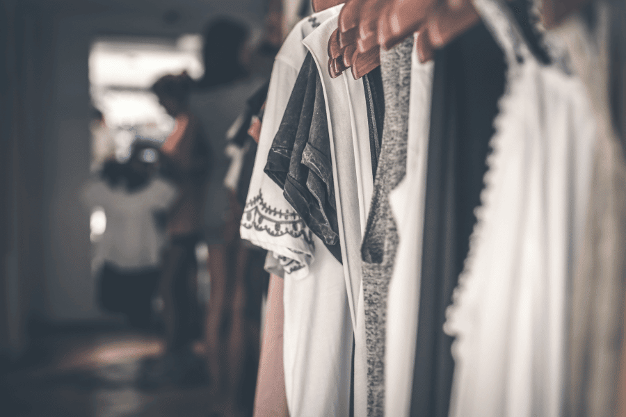 Best Secondhand Clothes Websites in the UK- Clothes on Hangers