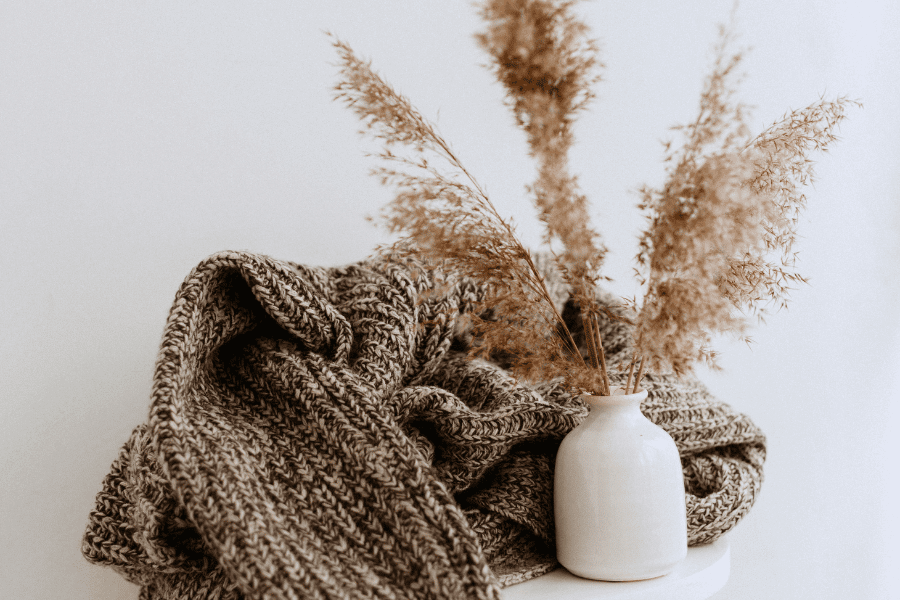 Sustainable Fabrics in the UK - Sweater and Dried Flowers