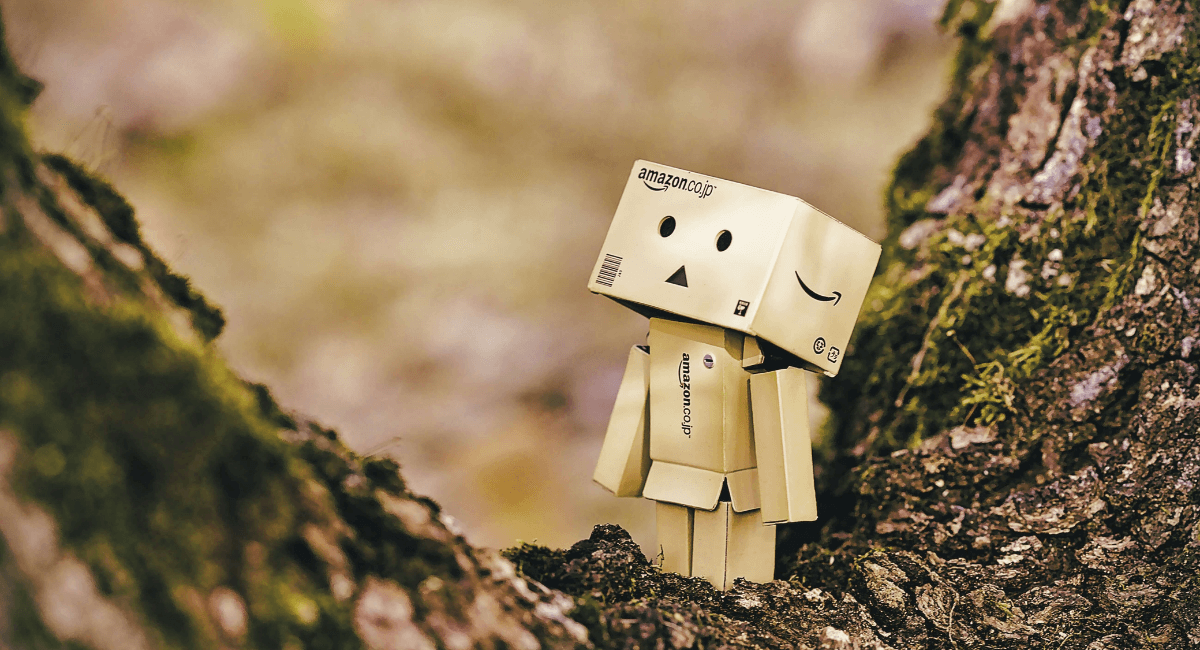 Amazon Statistics - Amazon cardboard robot in a tree