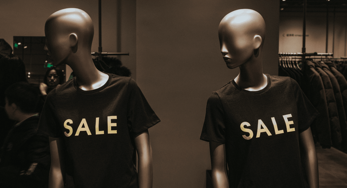 Coupon Statistics - Mannequins with T-shirts that say sale