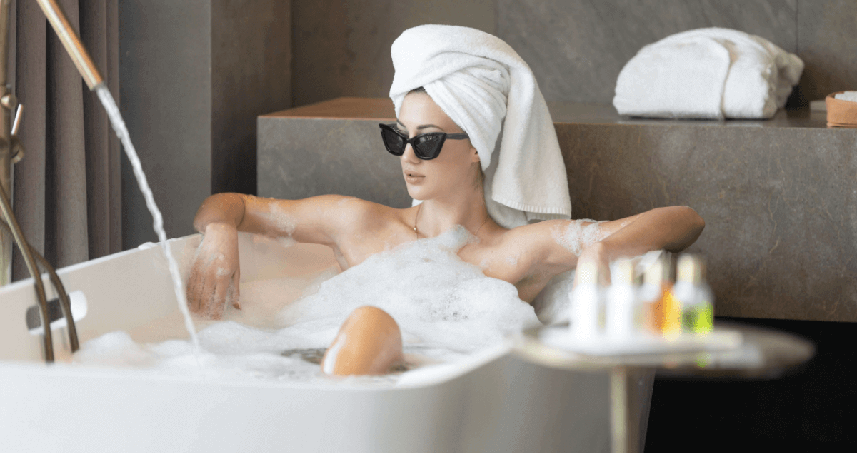 Luxury Shopping Statistics - Woman enjoying a luxury bath