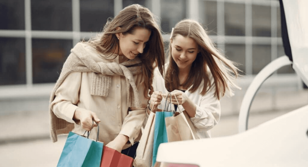 Shopping Addiction Statistics - Women with shopping bags